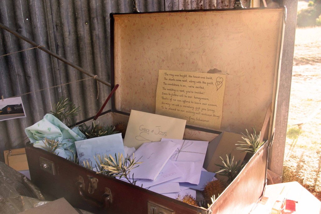 The Groom's Grandmother's suitcase made the perfect Wishing Well, and was further decorated with Native Banksias off the Chapman Valley property!