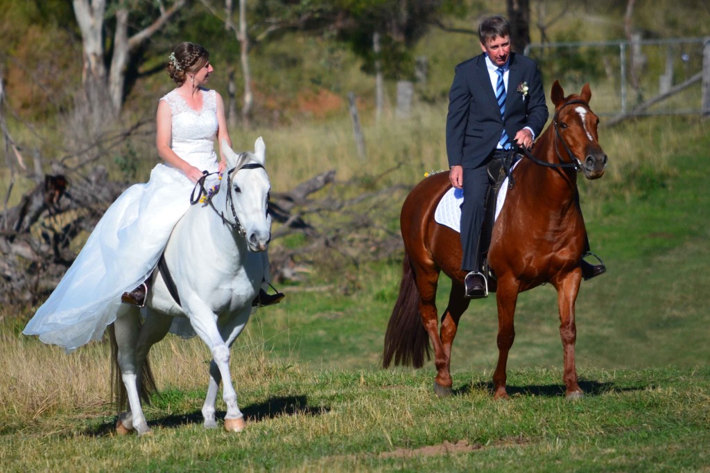 Grand Entrance - Jess and Peter ride up to the Ceremony location on Horseback.